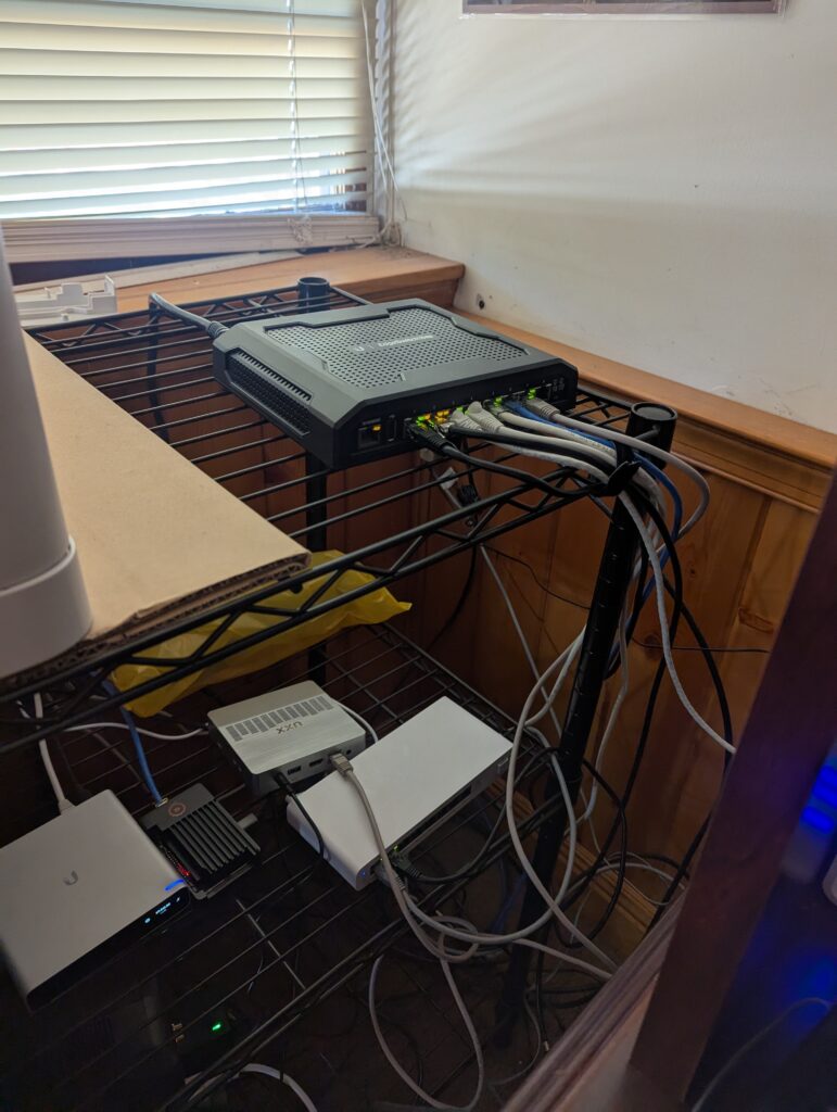 Managed network switch and equipment mounted on wire shelving