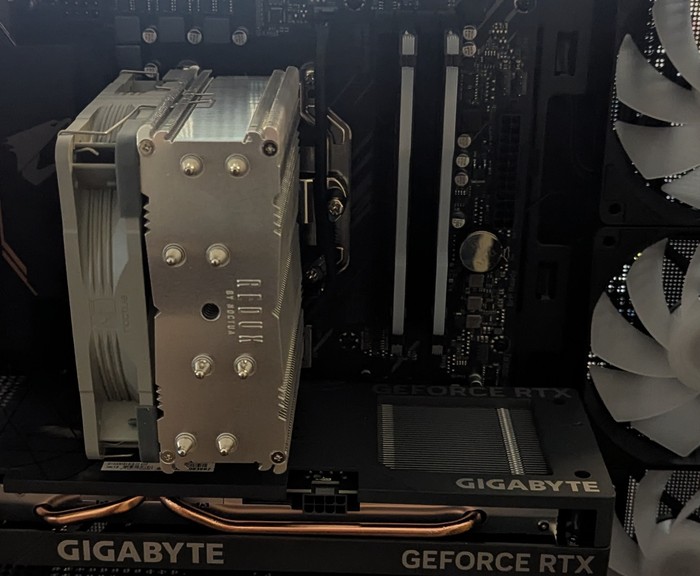 Custom PC build interior with CPU cooler and graphics card